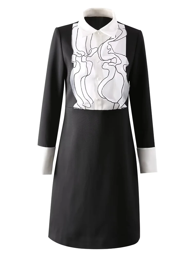 A collaged ruffle midi dress with artistic tailoring
